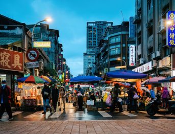 Taipei taiwan - 12. February 2023: Night market in Taipei with colorful stalls and lively crowds. The market is a hub of activity, showcasing the city’s vibrant culture and bustling nightlife.; Shutterstock ID 2470135339; purchase_order: -; job: -; client: -; other: