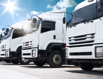 Row of Semi Trucks Parked on The Parking Lot. Big Rig, Tractor Truck. Shipping Cargo Container Trucks at The Port. Economy Business Transport on Road. Trucking. Freight Logistics Truck Transportation.; Shutterstock ID 2614932277; purchase_order: -; job: -; client: -; other: